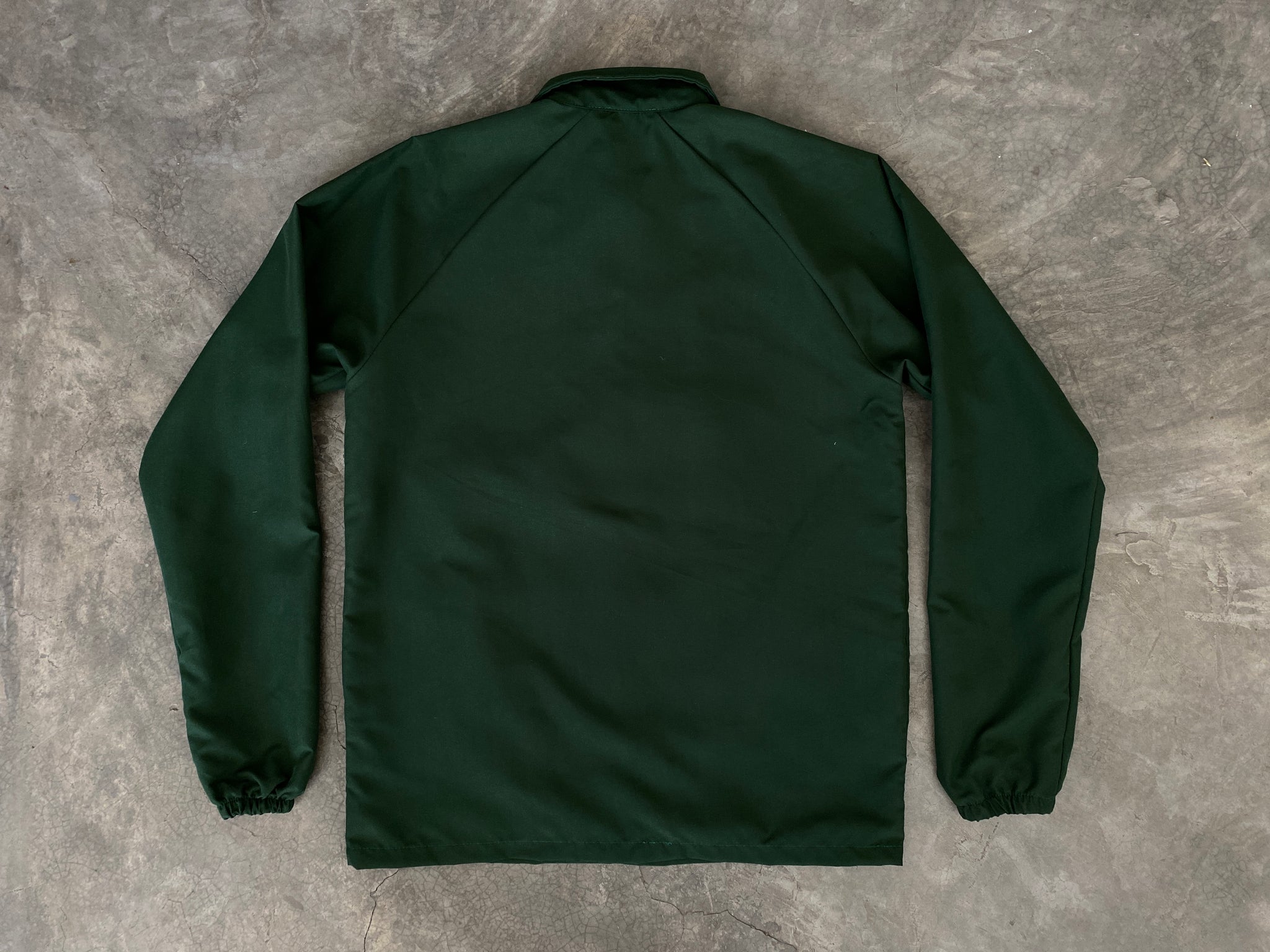 CHAMARRA COACH VERDE CON BROCHE
