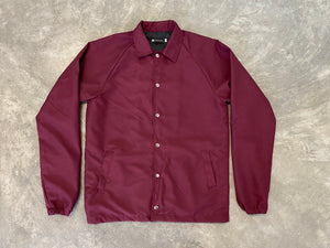 CHAMARRA COACH VINO CON BROCHE