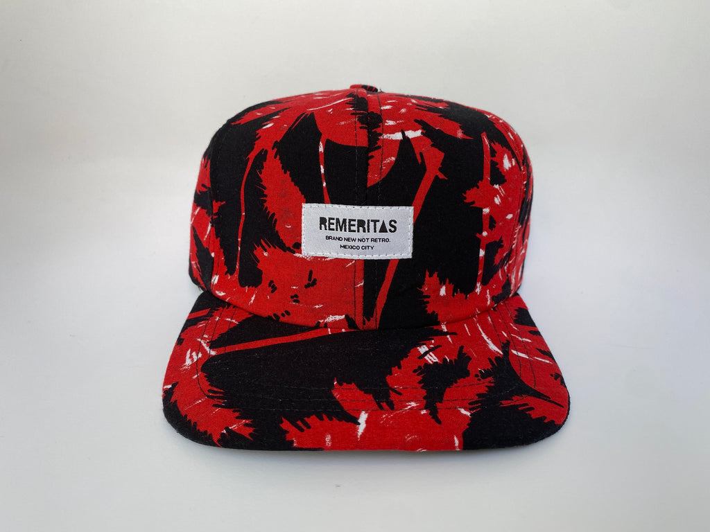 GORRA UNISEX CON FLORES VISERA PLANA